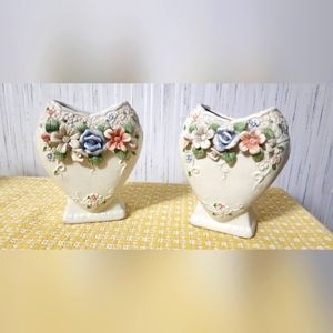 2 heart shaped vases. Approx 5 inches in height